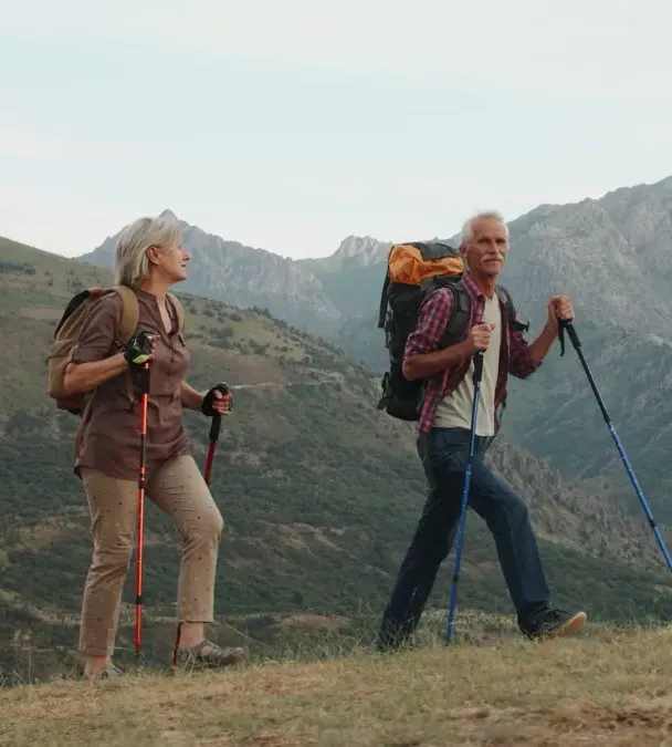 Happy elderly couple walking together on a sunny day
